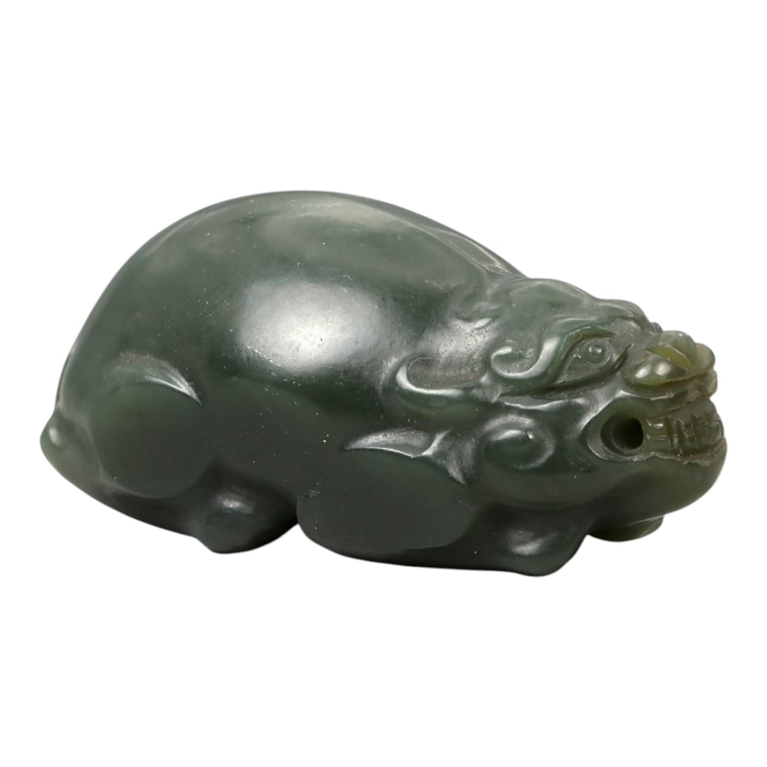 Chinese Jade Pixiu Beast - Carved Animal Figurine 4.2cm, 95ZC: Carved from green jade with areas of soft translucency and natural tonal variation, this compact sculptural figure depicts a pixiu rendered in a recumbent posture. The carving is worked fully in the r