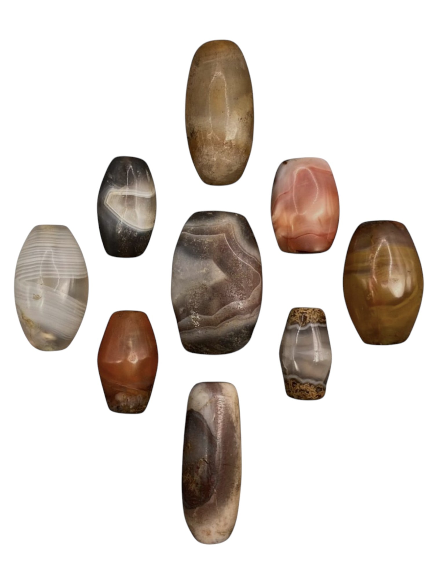 Lot of 9 Himalayan Banded Agate Beads, Ancient to Antique Period, 36WT: A group of nine beads crafted from banded agate, showcasing natural hues including translucent grey, milky white, smoky brown, warm amber, and soft peach tones, with characteristic concentric, wavy, a