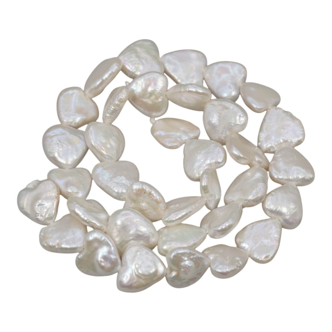 A Strand of Baroque Cultured Pearls, 20th Century, 88ZJ: Composed of baroque cultured pearls with a creamy white body color and soft iridescent overtones, the strand is strung in a single continuous line. Each pearl exhibits a highly irregular, flattened, a
