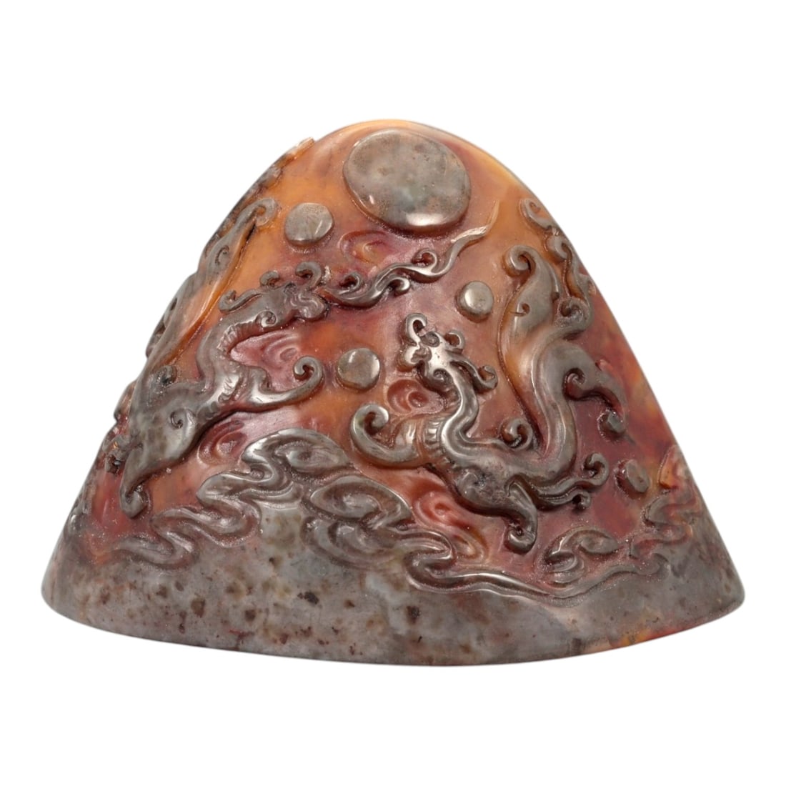 A Chinese Shoushan Stone Stamp Seal, 20th Century, 1FA: Carved from variegated Shoushan stone displaying tones of reddish-brown, russet, and grey with natural mottling, the seal is worked with a tapering, irregularly domed upper section and a flat oval sea