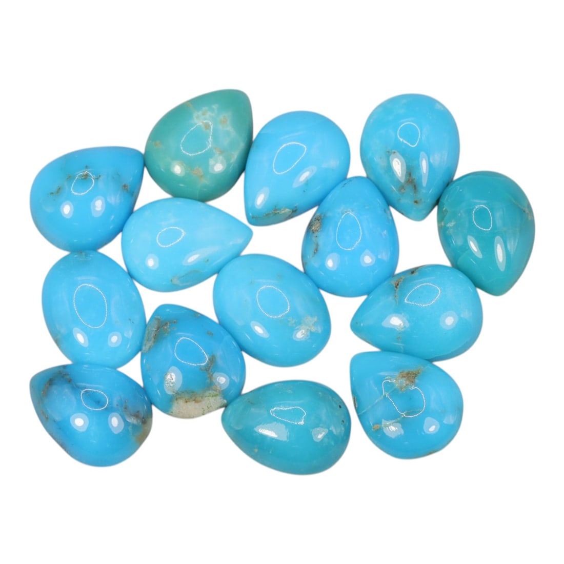 12.53 Carats Bright Blue Turquoise Parcel - Natural Sleeping Beauty Style Stones, 76XC: This curated parcel of polished turquoise cabochons radiates with the iconic, vivid sky-blue hue prized by collectors and jewelers alike. The lot includes a mix of pear and oval shapes, each with a sm
