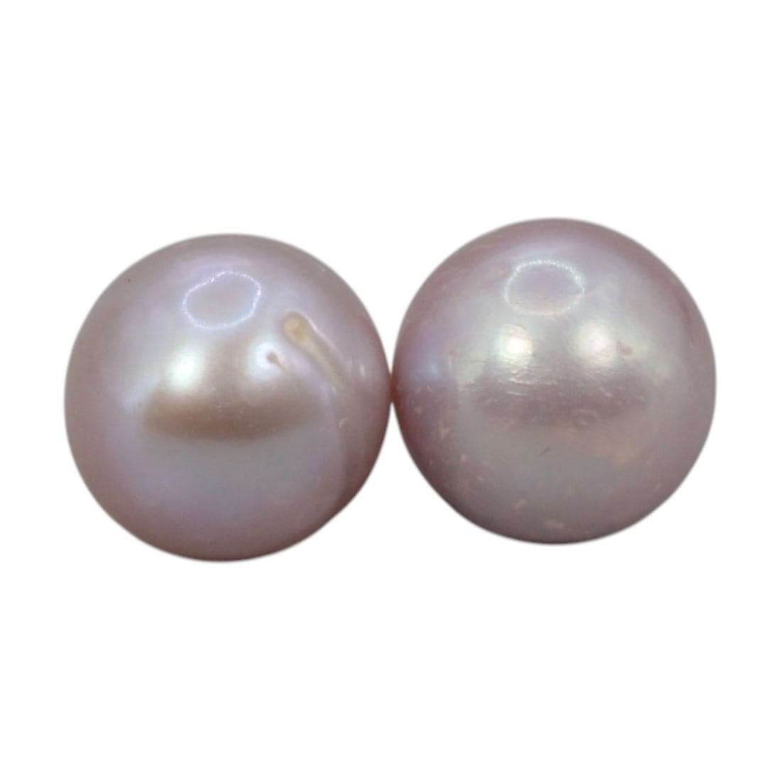 Freshwater Pearl Pair - Natural Pearl Lavender Round Gemstones 7.5mm, 27XA: A matched pair of natural freshwater pearls, exhibiting a soft lavender-pink hue with moderate luster and subtle iridescent orient. The pearls are near-spherical, with visible natural surface inclusio