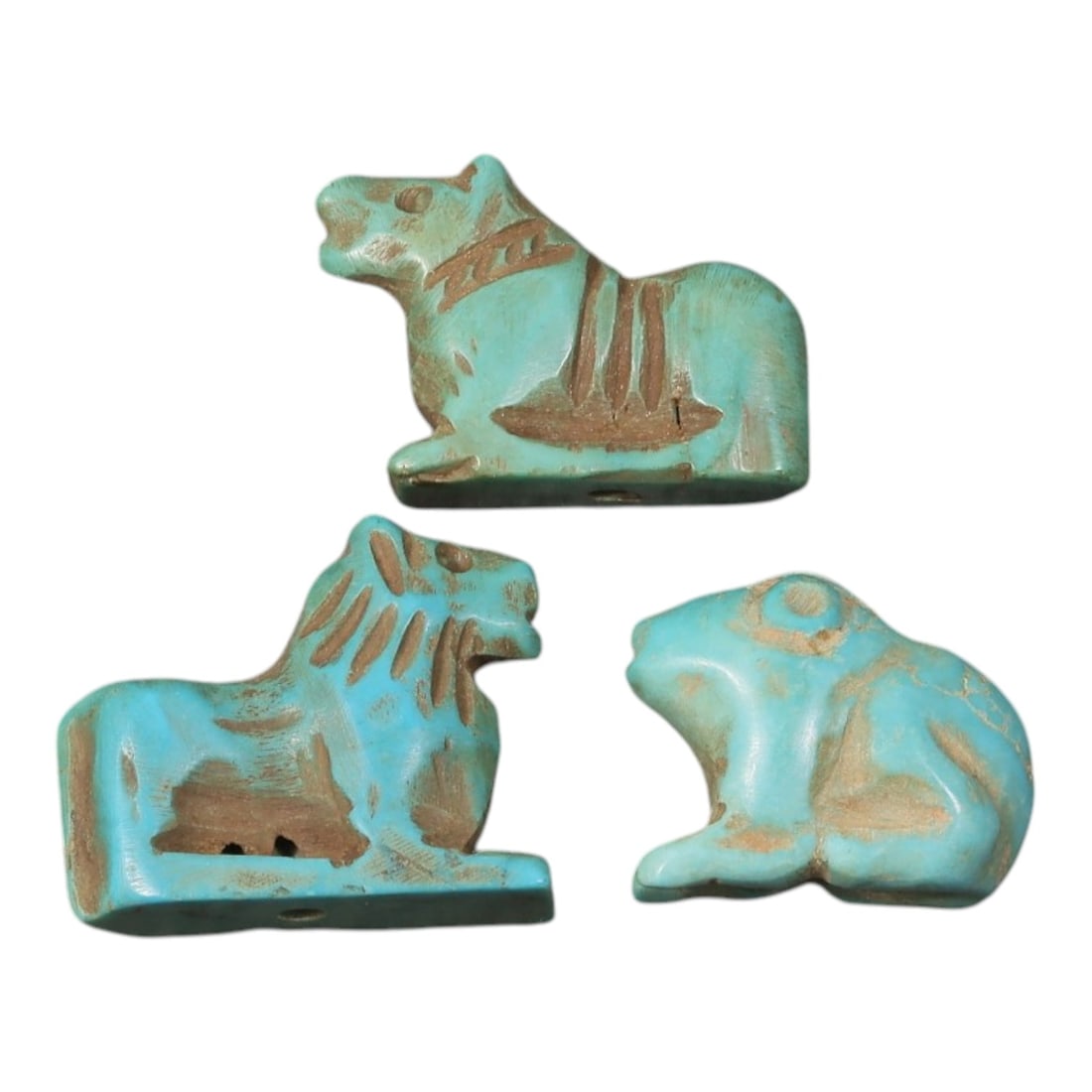 Lot of 3 Ancient Coptic Egyptian Turquoise Stone Zoomorphic Amulets, Circa Roman to Coptic Era, 86AD: Comprising three finely carved turquoise stone amulets ranging from 1.5 cm to 1.8 cm, these pieces showcase the stylized animal forms characteristic of Coptic Egyptian devotional jewelry. The group in