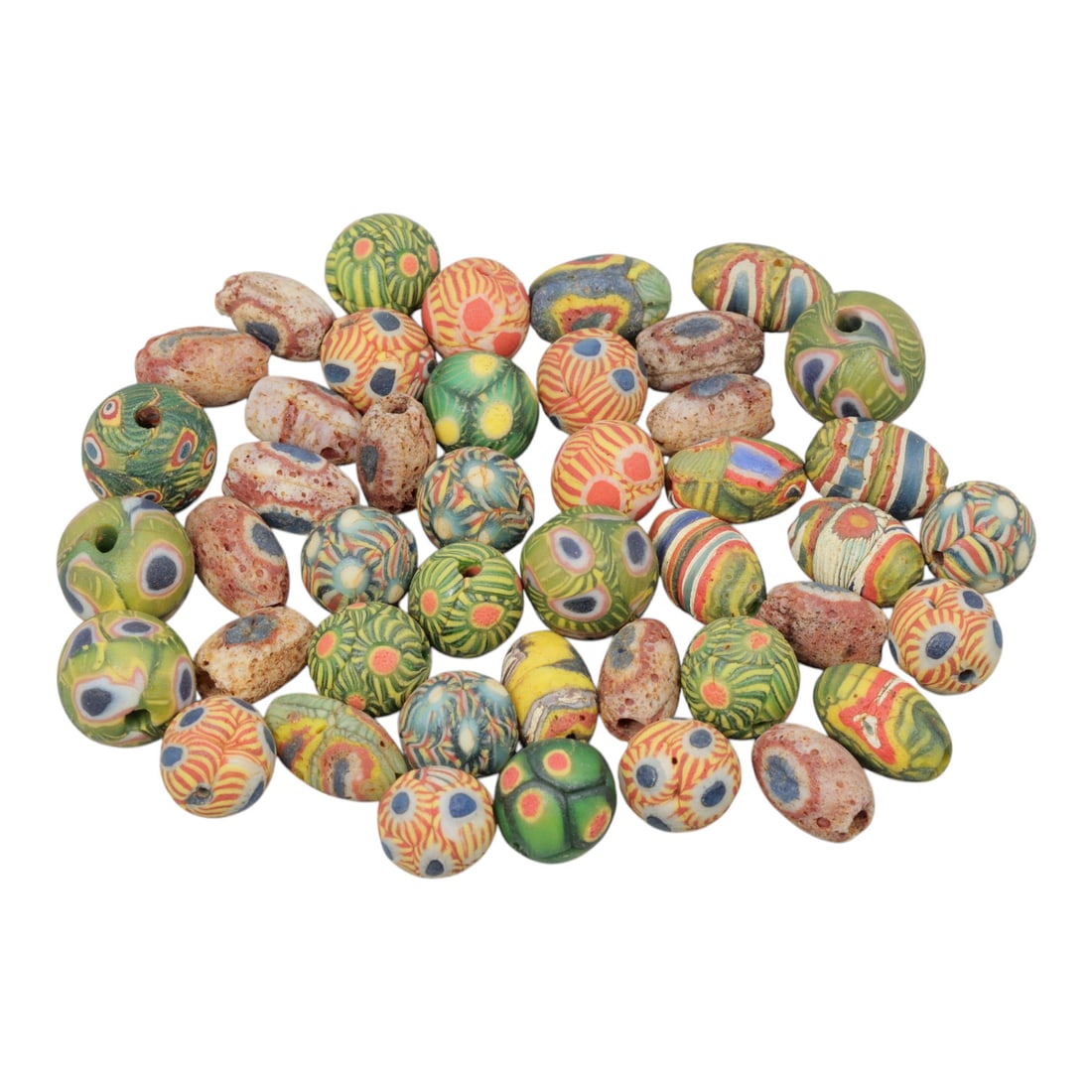A Lot of 44 Vintage Artisan Glass Trade Beads, 30WM: A curated collection of 44 glass trade beads, primarily spherical and slightly oval in form, all with central perforations. The beads feature intricate patterns including eye motifs, striped designs, 
