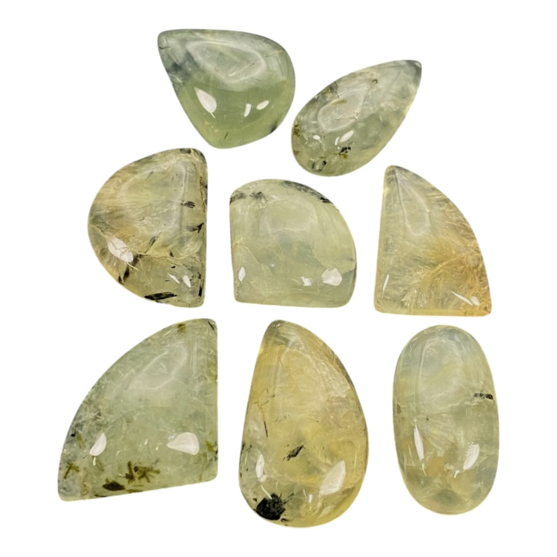 219 Carats Prehnite Cabochon Suite - Natural Malagasy Single Parcel, 68ZJ: This substantial suite of eight prehnite cabochons, ranging in size from 2.1 to 3.1cm, features a palette of soft, translucent green to pale yellow-green hues, characteristic of high-quality prehnite 