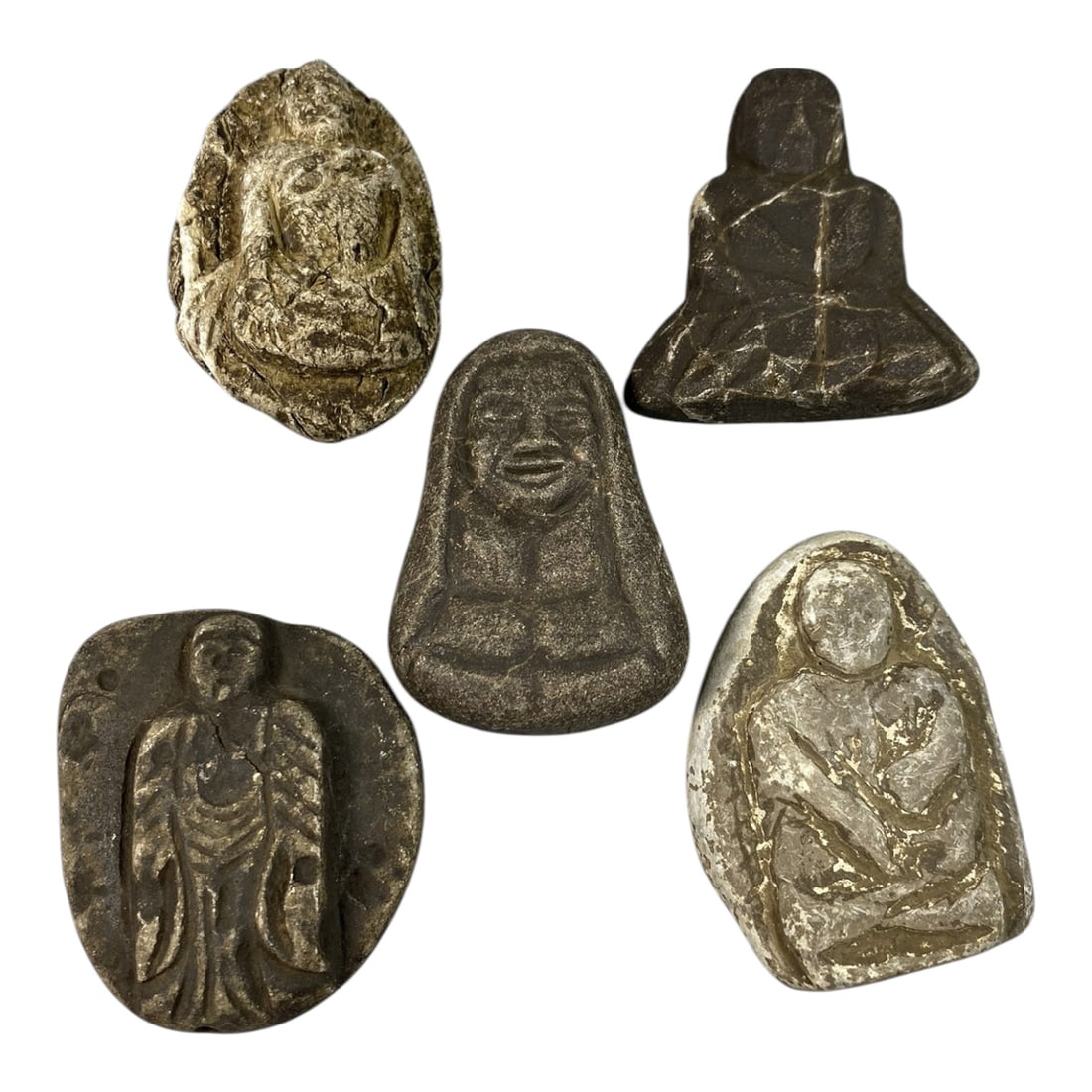 Lot of 5 Antique Japanese Edo Period Stone Buddhist Figurines, 71AG: A collection of five hand-carved stone Buddhist amulets attributed to the Edo period (1603-1868), Japan. Crafted from weathered stone with deep patination and traces of white pigment, these pieces sho