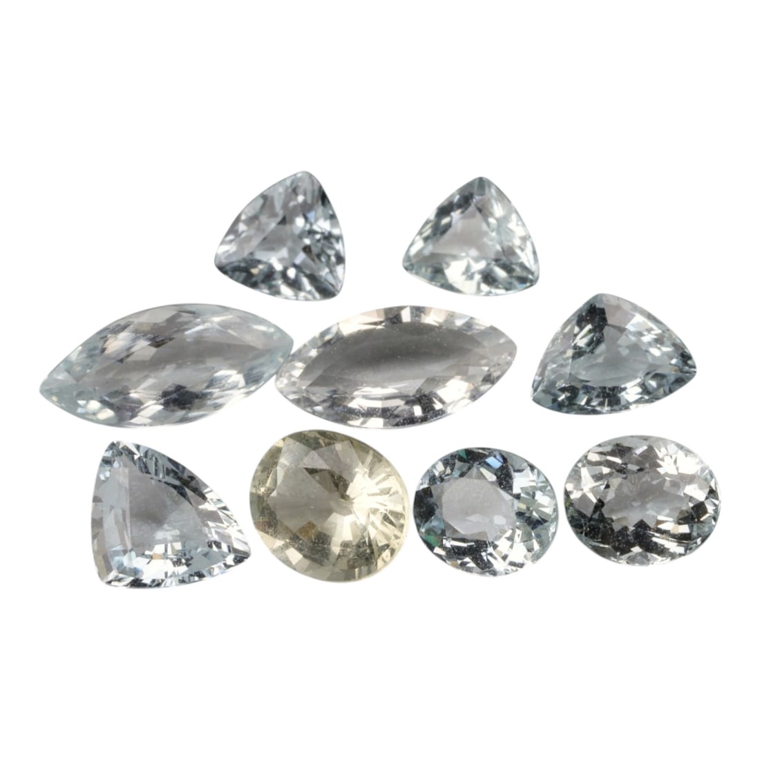 5.43 Carats Mixed Cut Aquamarine Selection - Natural Brazilian Stones, 92XN: This curated selection of ten faceted aquamarine gemstones, weighing a total of 5.43 carats with individual dimensions ranging from 5.2 to 10.4 mm, showcases the iconic cool blue clarity of the gem al