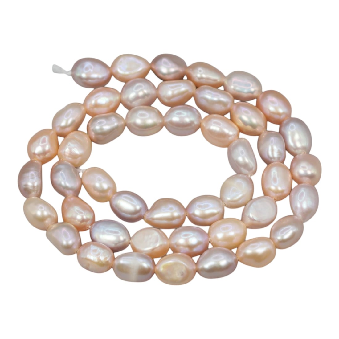 A Strand of Baroque Cultured Pearls, 20th Century, 83ZJ: Composed of baroque cultured pearls with a soft peach-pink body color and subtle iridescent overtones, the strand is strung in a single continuous line. Each pearl exhibits an irregular, slightly elon
