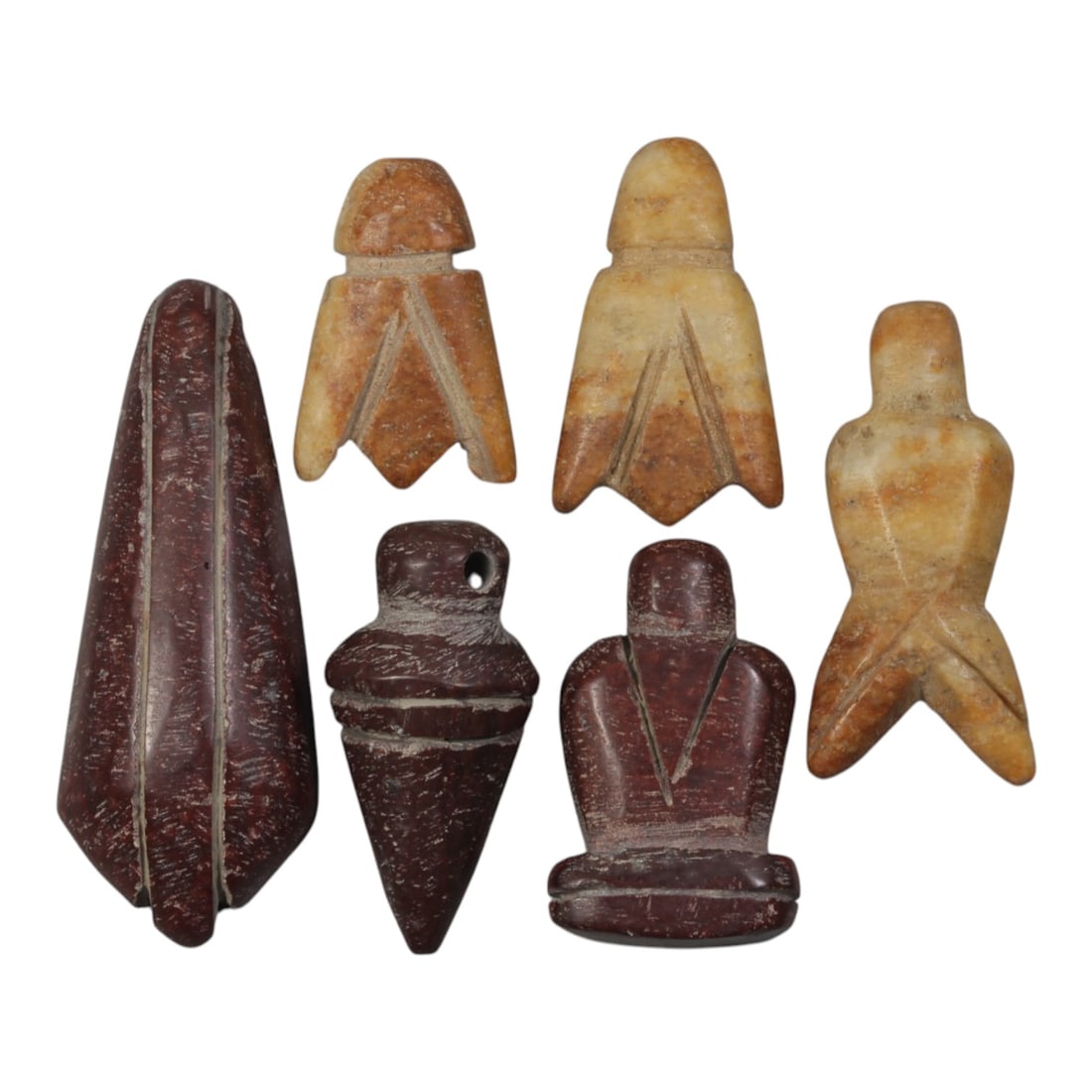 Lot of 6 Ancient Coptic Egyptian Stone Amulets, Circa Roman to Coptic Era, 86WT: Carved from various stones, including reddish-brown and tan varieties, the group consists of six distinct amulets. The set includes a large conical pendant with central grooves, three stylized fly-sha