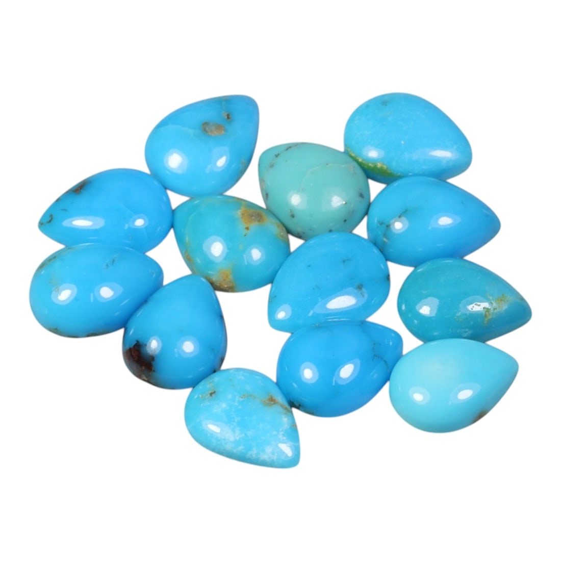 11.16 Carats Natural Turquoise - Pear Cabochon Gemstone, 17XB: Pear cabochon-cut turquoise gemstone, crafted from natural turquoise material. The stone displays a vibrant sky-blue to turquoise hue, with natural matrix inclusions and subtle veining characteristic 