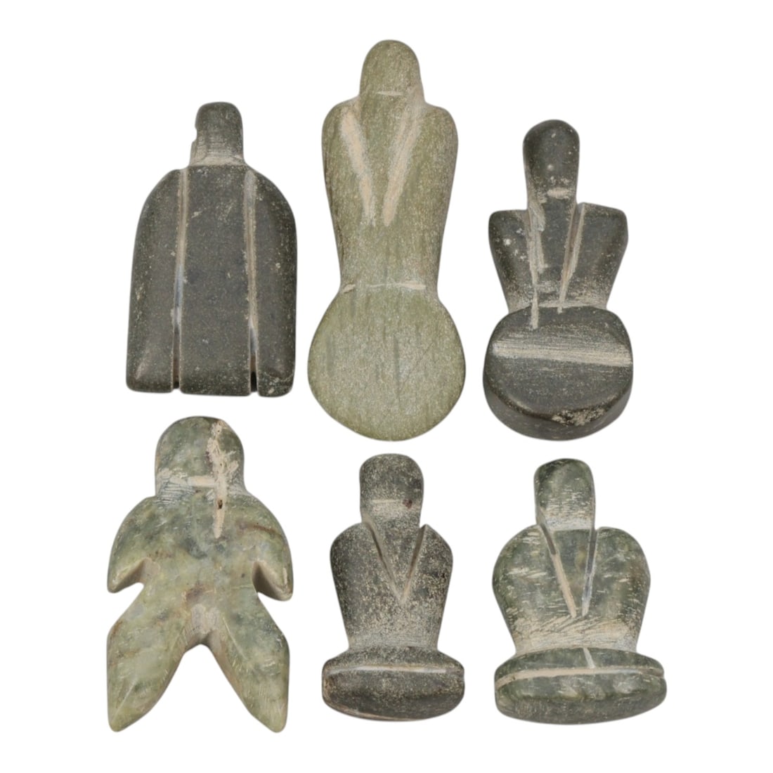 Lot of 6 Ancient Coptic Egyptian Green Stone Amulets, Circa Roman to Coptic Era, 72WT: Carved from green and dark grey stone, the group consists of six distinct amulets, ranging in size from 2 cm to 3.5 cm (0.79-1.38 in.). The set includes stylized fly-shaped, humanoid, and geometric fo