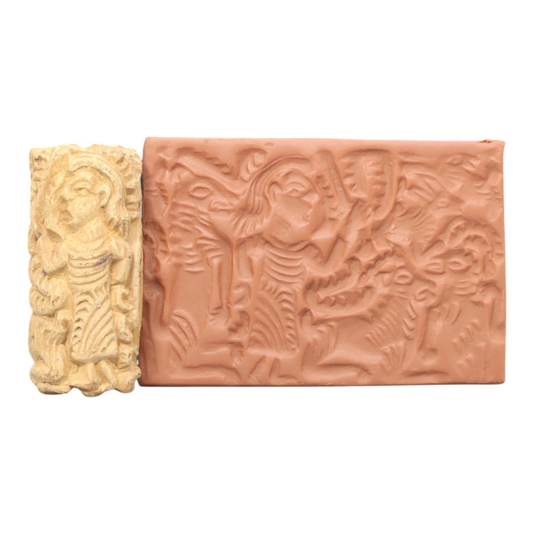 Ancient Steatite Cylinder Seal - Mesopotamian Hero & Beast, 78ZS: Crafted from smooth steatite, this ancient Mesopotamian cylinder seal bears a finely carved relief scene of a heroic figure in dynamic combat with a ferocious beast, a core iconographic motif of Mesop