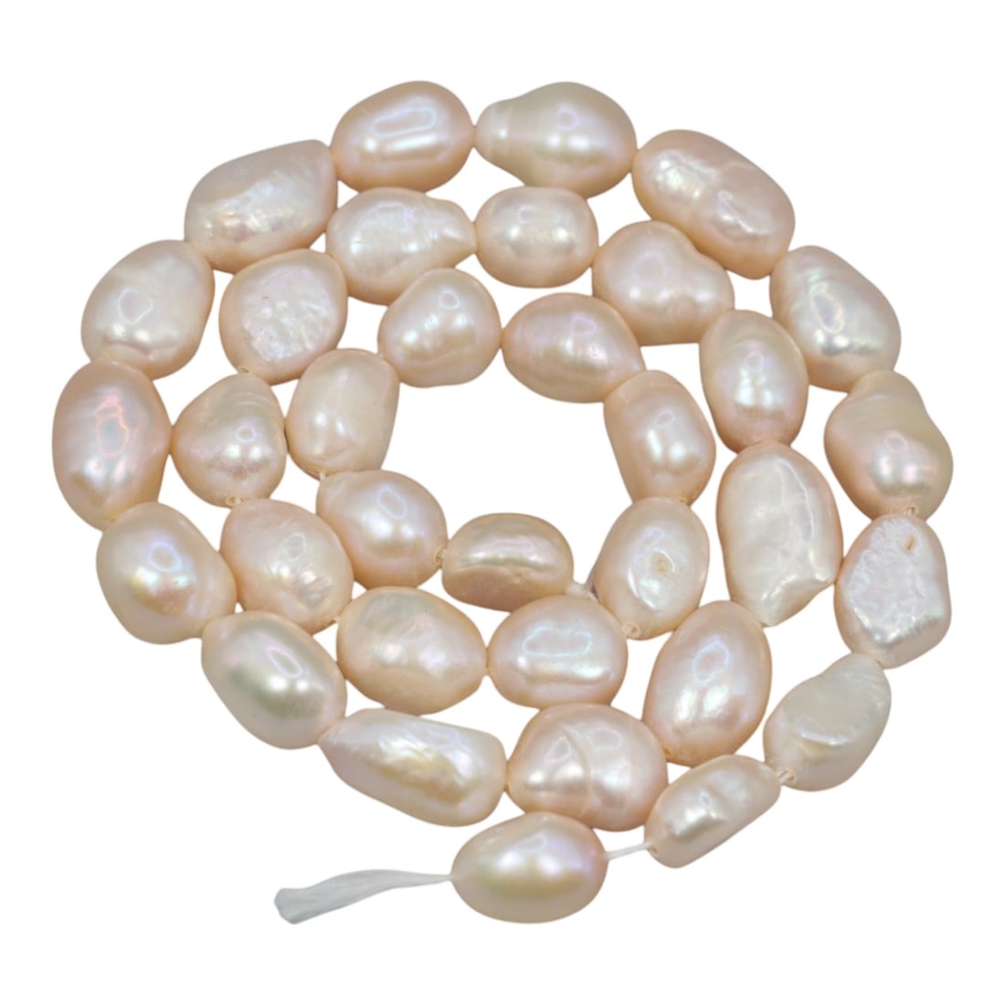 A Strand of Baroque Cultured Pearls, 20th Century, 80ZJ: Composed of baroque cultured pearls with a pale creamy-white body color and soft iridescent overtones, the strand is strung in a single continuous line. Each pearl exhibits an irregular, non-symmetric