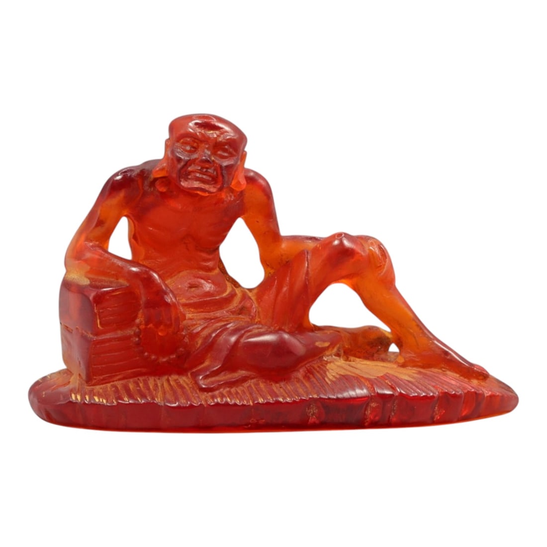 A Chinese Amber-Resin Luohan Figure, 20th Century, 42YC (1 of 2)