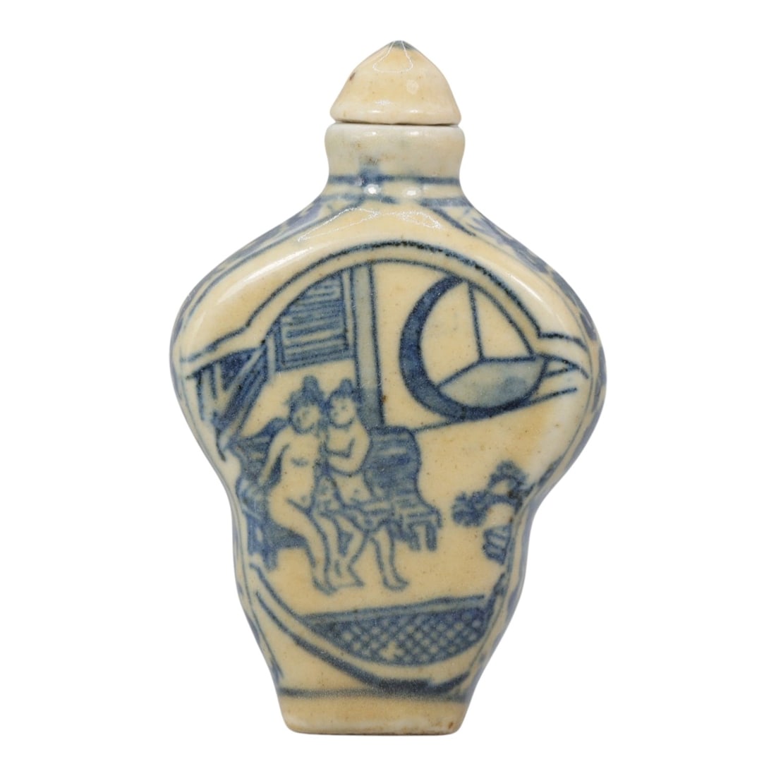 A Chinese Porcelain Snuff Bottle, 20th Century, 12YD: Crafted from porcelain with a pale cream glaze and decorated in underglaze blue, the snuff bottle features a flattened, quatrefoil-shaped body, a short cylindrical neck, and a conical stopper. The mai