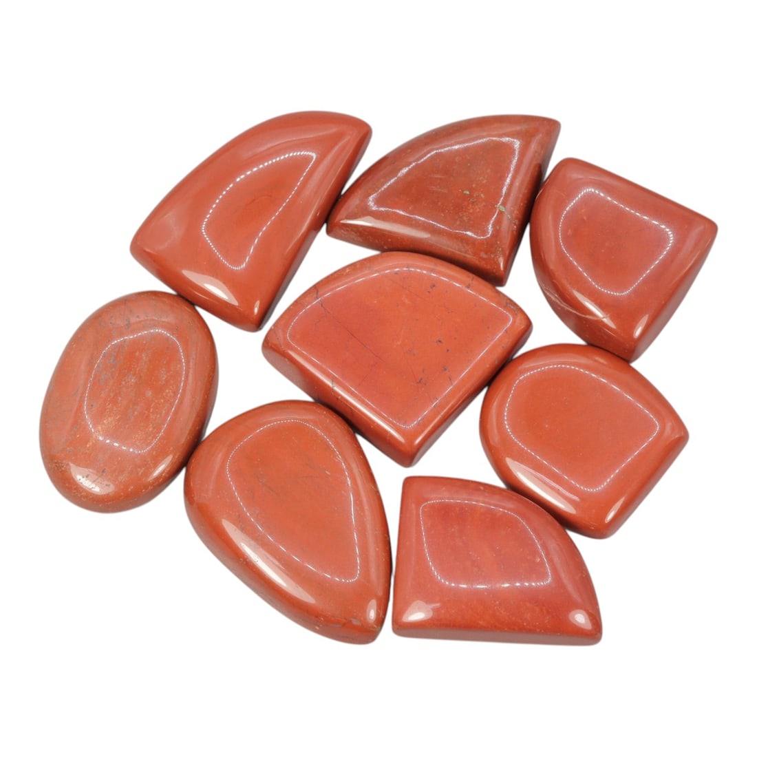 350.58 Carats Natural Red Jasper Cabochon Parcel (8 Pieces), 2WC: This bold set of 8 polished red jasper cabochons features a rich, uniform terracotta-red hue, with subtle natural mineral flecks and faint veining visible across the smooth, high-gloss surface. The ca