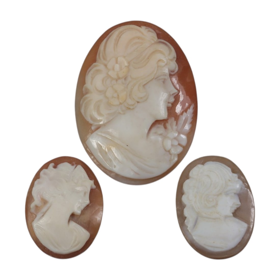 Lot of 3 Antique Victorian Shell Cameos, 53AH: A collection of three antique cameos, hand-carved from natural shell, dating to the Victorian era. Each oval cameo features a classical female profile in raised relief, showcasing the era's neoclassic