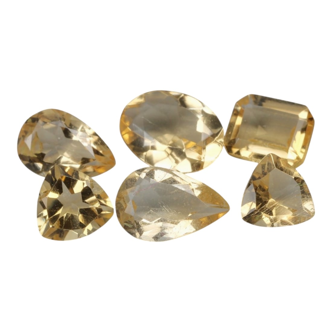 3.49 Carats Golden Yellow Citrine Parcel - Natural Brazilian Mixed Cut Stones, 29ZH: This curated parcel of citrine gems radiates a warm, luminous golden yellow hue, reminiscent of sunlit honey and liquid amber. The stones are presented in a variety of precision cuts-including pear, e
