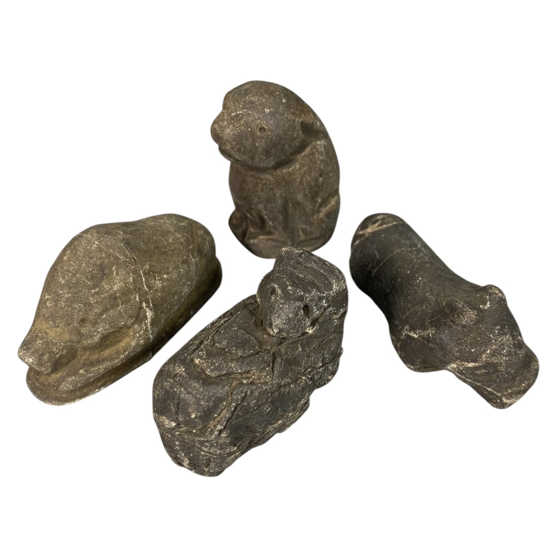 Lot of 4 Medieval Mediterranean Zoomorphic Stone Carvings, 85AG: A collection of four hand-carved stone zoomorphic figurines, attributed to medieval folk or tribal art traditions of the Mediterranean region. Crafted from weathered dark stone with deep patination, s