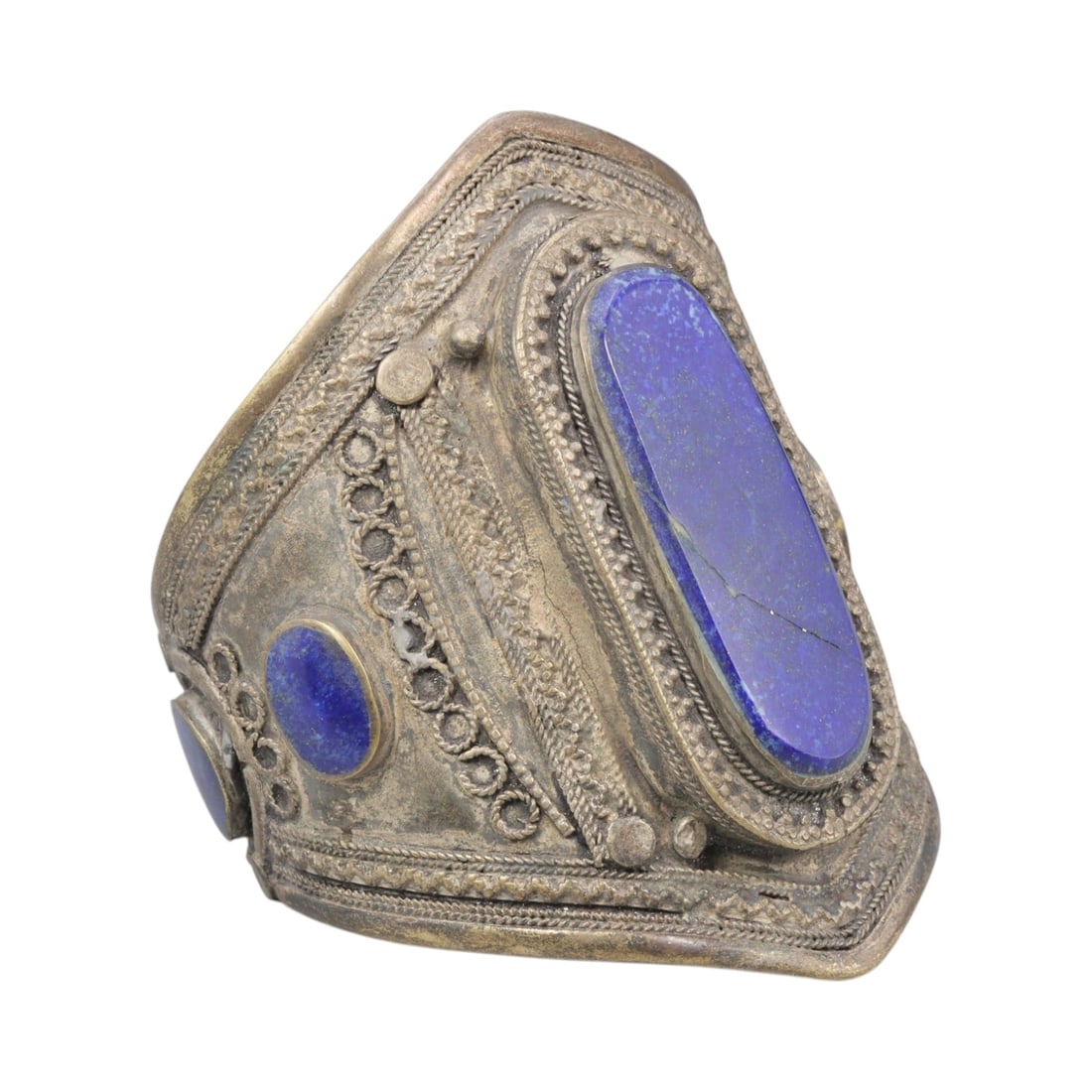 A Vintage Central Asian Silver-Plated Lapis Lazuli Cuff Bracelet, 33AH: A handcrafted vintage cuff bracelet, measuring approximately 6 cm in width, showcasing traditional Central Asian (Afghan/Turkmen) tribal jewelry design. The piece features a silver-plated metal base, 