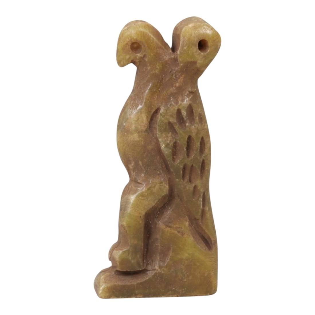 Ancient Steatite Vulture - Near Eastern Amulet Figurine, 90AK: Carved from steatite, this amulet depicts a stylized perched vulture with incised linear details defining the wing feathers, body, and facial features including a defined eye and beak, with two suspen