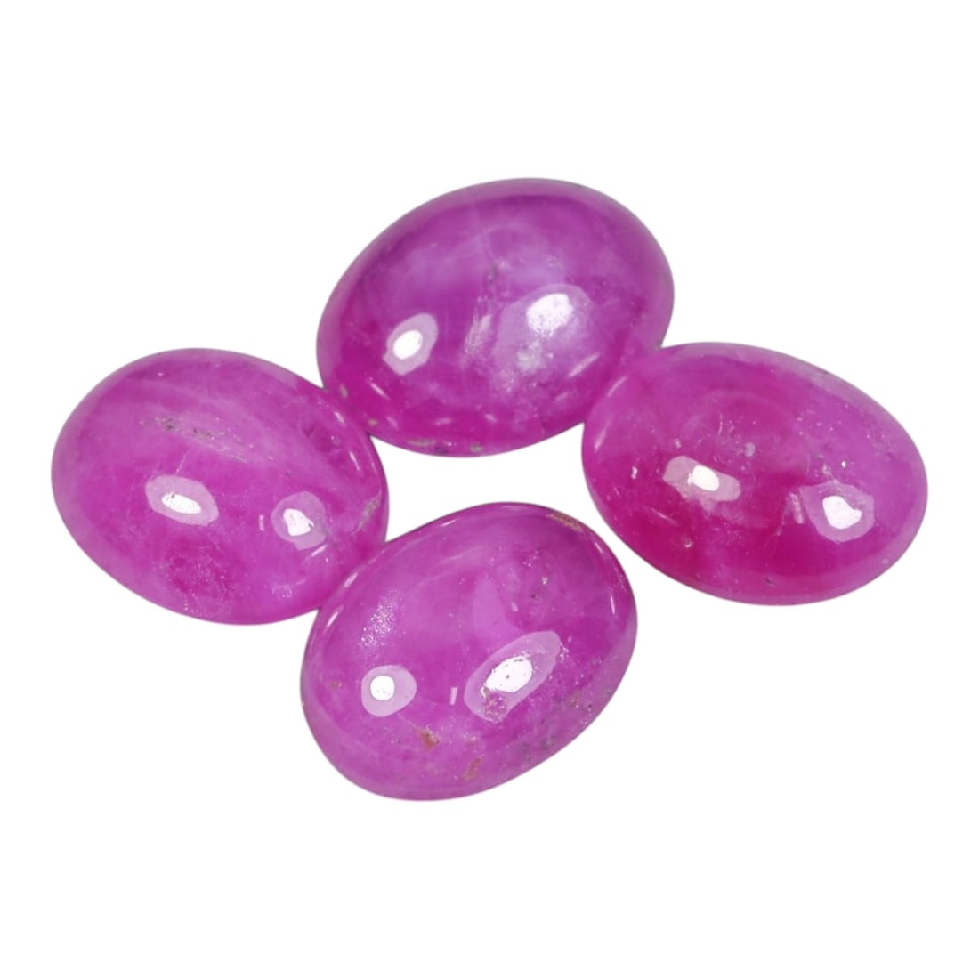 6.49 Carats Natural Ruby - Oval Cabochon Gemstone, 95WE: Oval cabochon-cut ruby gemstone, crafted from natural ruby material. The stone exhibits a vivid, saturated pinkish-magenta hue, with subtle natural inclusions and internal veining characteristic of un