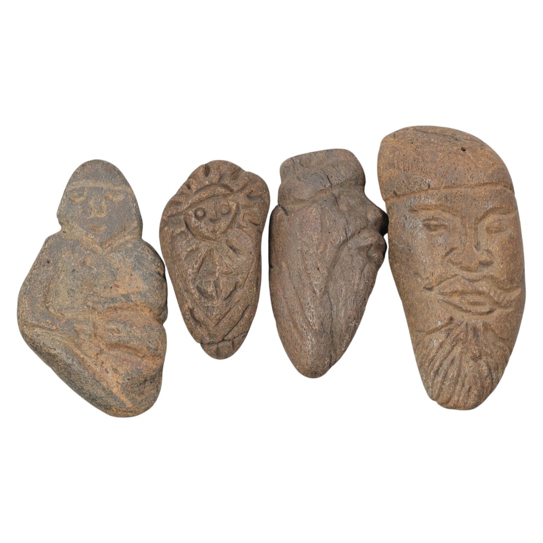 Lot of 4 Medieval Tribal Stone Carvings, Mediterranean Region, 29WT: A set of four hand-carved stone objects, measuring approximately 5-8 cm in height, showcasing medieval tribal stonework from the Mediterranean region. The pieces include a seated human figure, a styli