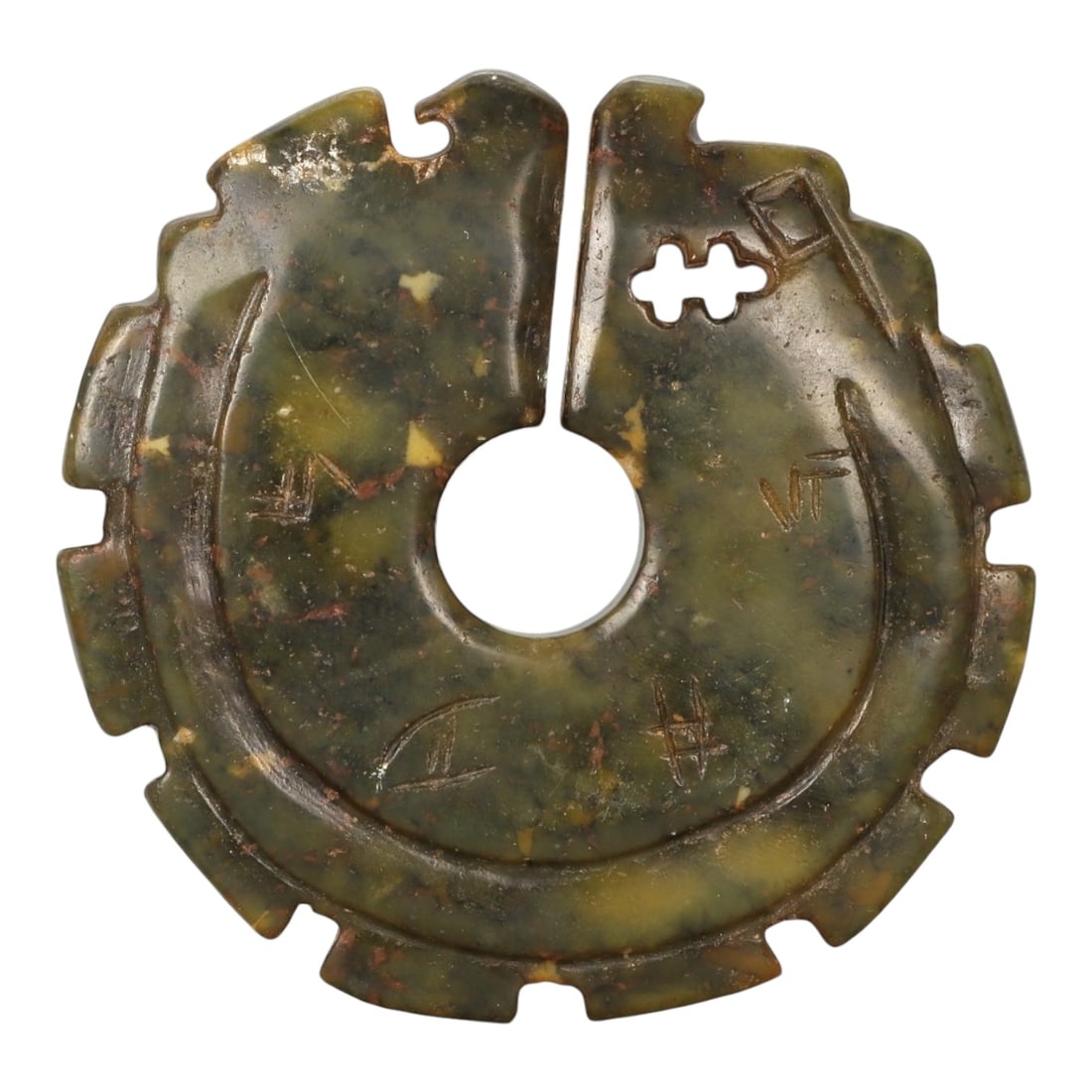 A Chinese Hardstone Bi-Form Disc, Reverse Side, Possibly Late Qing to Early Republic Period, 87FC: The reverse of the hardstone bi-form disc reveals the mottled olive-green stone with scattered russet, yellow, and darker mineral inclusions more prominently, largely left undecorated to emphasize the