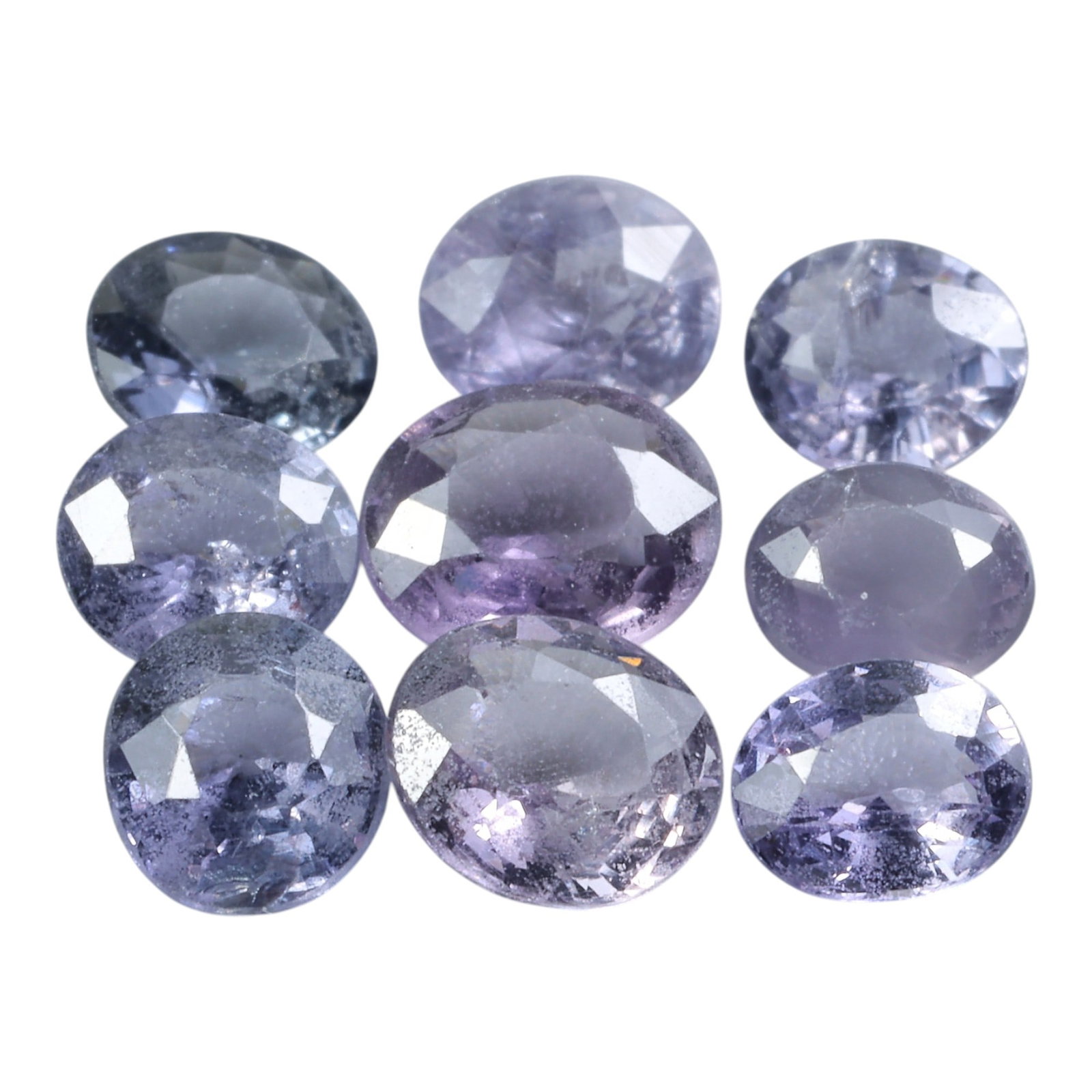 4.42 Carats Lavender Spinel Parcel - Natural Loose Stones, 48XP: This delicate parcel of spinel features a dreamy spectrum of lavender and soft violet hues, ranging from pale lilac to deeper, misty purple tones. The total carat weight of the lot is 4.42 carats, wit