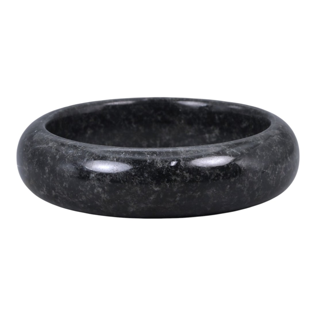 A Chinese Jadeite Bracelet Bangle, 6.4cm Inner Diameter, 13WE: Carved from jadeite, the bracelet is formed as a continuous circular bangle with a rounded cross-section and a uniformly polished surface. The interior and exterior edges are smoothly finished, indica