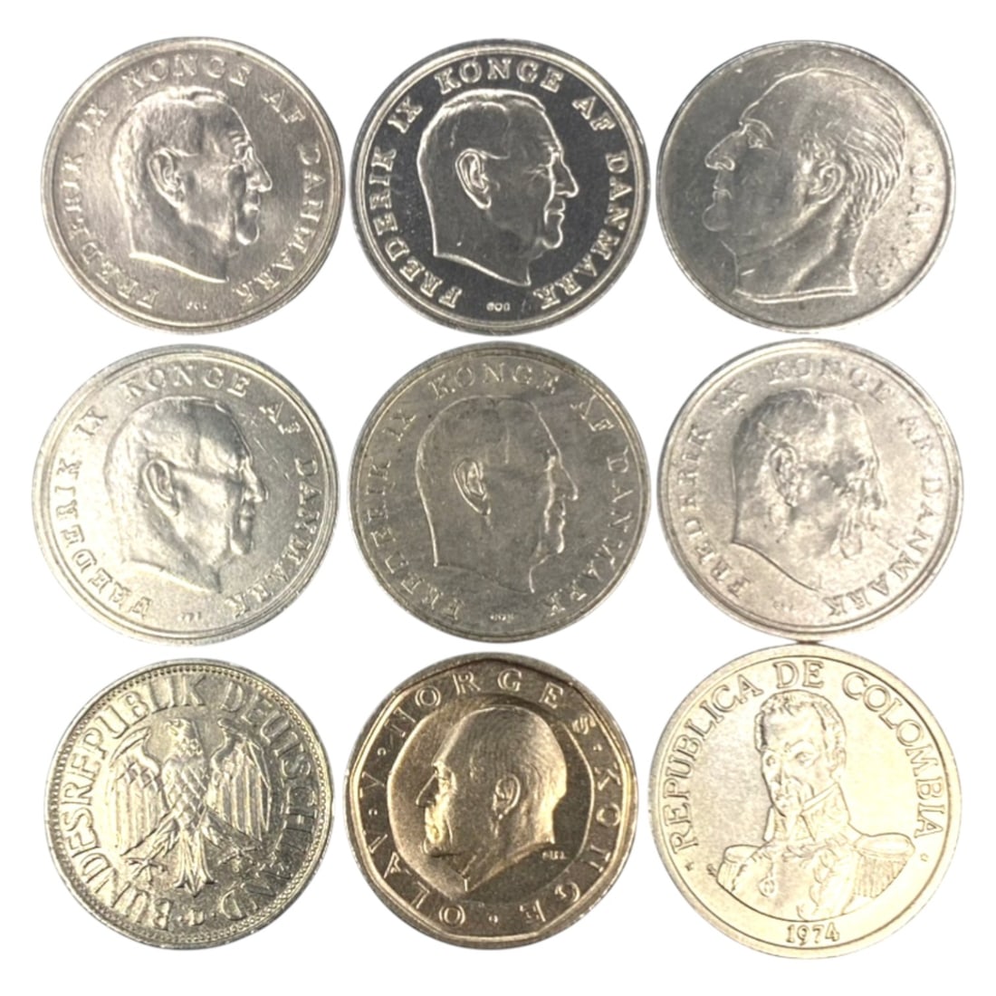 GLOBAL: Nordic & Post-War Stability - 9-Piece Coins Set, 1963-1985, 23-25mm, 28ZJ: This curated 9-Piece Coins Set spans the mid-to-late 20th century, featuring coins from Denmark, Norway, West Germany, and Colombia, ranging from 23 to 25mm in diameter. Each piece anchors to a moment
