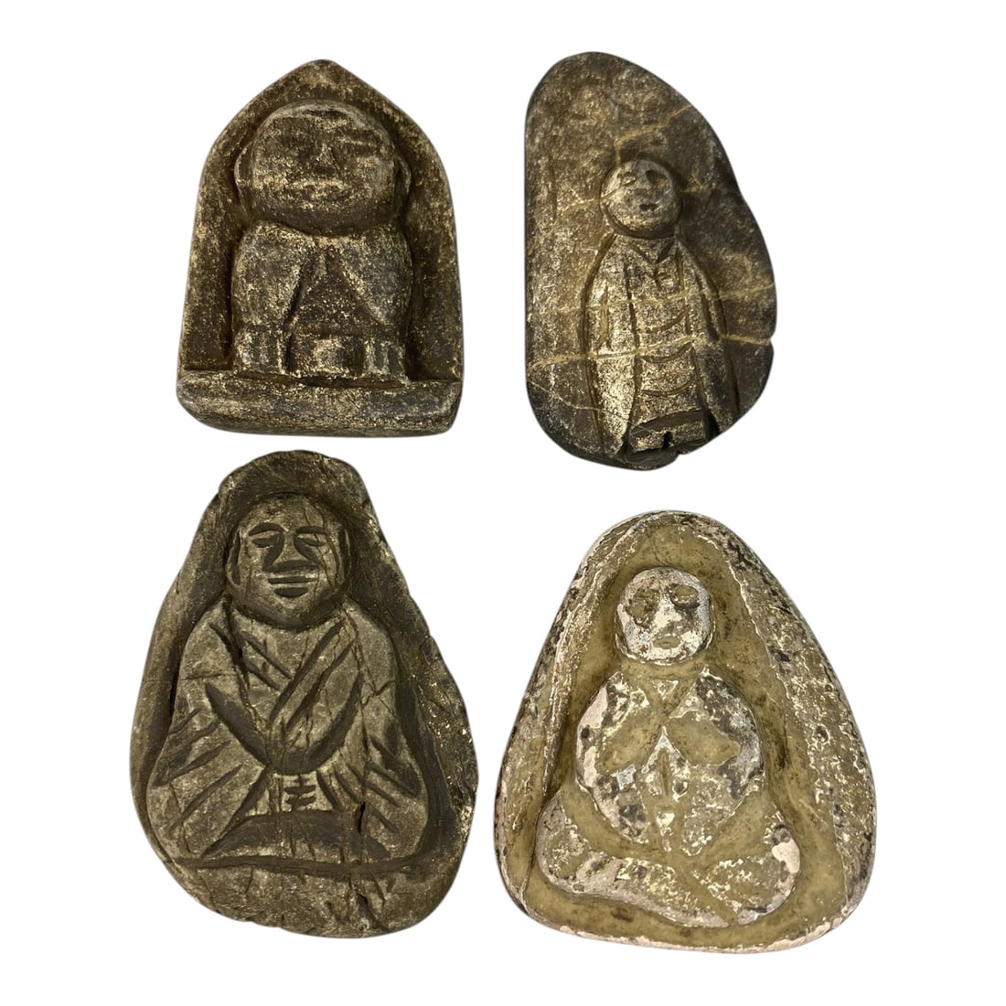 Lot of 4 Antique Japanese Edo Period Stone Buddhist Figurines, 82AG: A collection of four hand-carved stone Buddhist amulets attributed to the Edo period (1603-1868), Japan. Crafted from weathered stone with deep patination and traces of white or silver pigment, these 