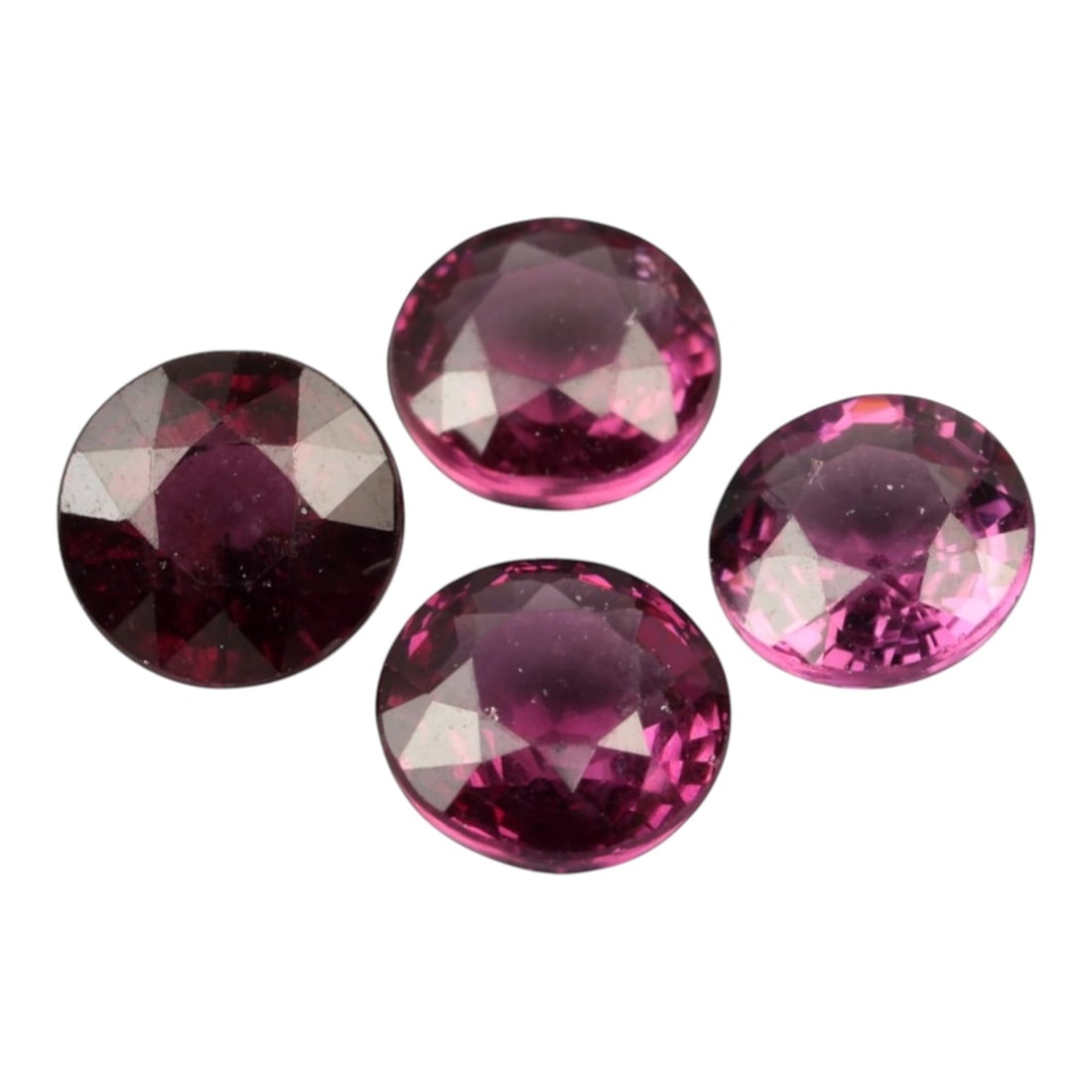 3.07 Carats Fuchsia Red Garnet Parcel - Natural Tanzanian - 5.3x5.2x3.0 mm, 32XK, 32XK: This vivid quartet of garnet gems dazzles in a palette of fuchsia-red and raspberry hues, each stone catching the light with lively brilliance. Cut in symmetrical round profiles, the stones display ex
