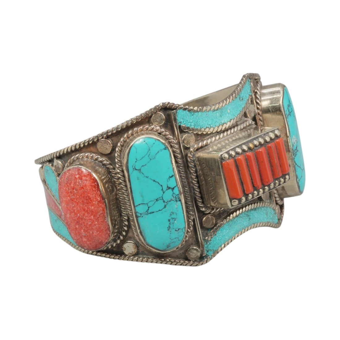 A Vintage Himalayan Silver-Plated Multi-Stone Inlay Cuff Bracelet, 37AH: A handcrafted vintage cuff bracelet, measuring approximately 6 cm in width, showcasing traditional Himalayan jewelry design. The piece features a silver-plated metal base adorned with elaborate multi-