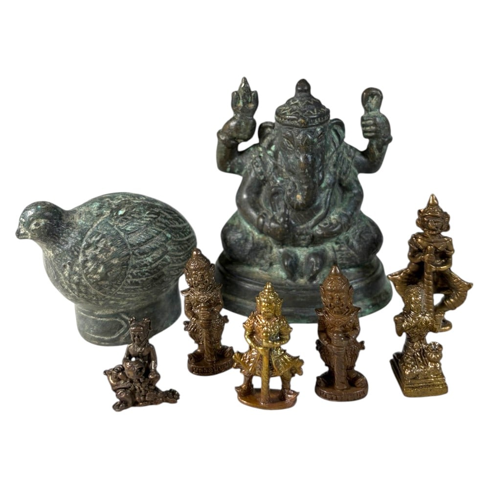 A Group of 8 Vintage Southeast Asian Bronze and Brass Figurines, 35AA: Comprising eight cast metal pieces ranging from 2.5 to 8 cm in height. The collection features a patinated bronze seated Ganesha figure, a bird-shaped vessel, and six smaller guardian or deity figurin