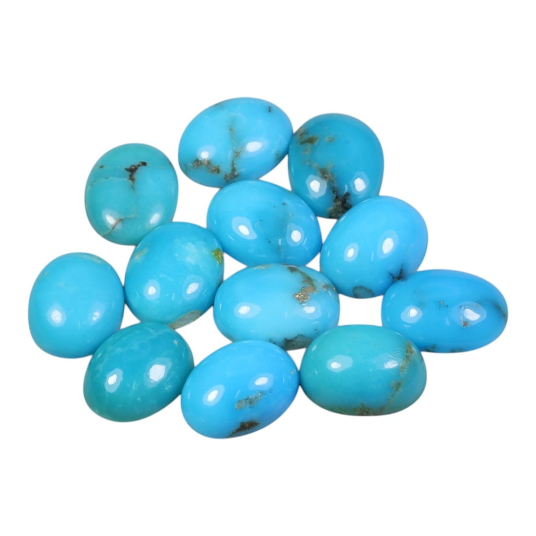 12.31 Carats Natural Turquoise - Oval Cabochon Gemstone, 100WE: Oval cabochon-cut turquoise gemstone, crafted from natural turquoise material. The stone displays a vivid sky-blue to turquoise coloration, with natural matrix inclusions, pyrite flecks, and subtle ve