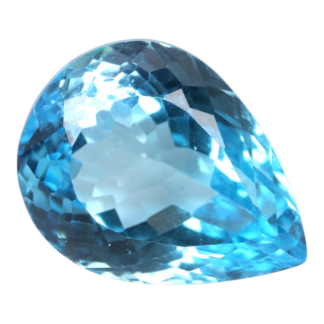 37.64 Carats Swiss Blue Topaz Pear - Natural Brazilian Stone, LZ108: This magnificent pear-cut Swiss blue topaz radiates with a vibrant, icy blue hue that evokes the clarity of alpine lakes and glacial skies. The gem is masterfully faceted, with precisely angled surfac