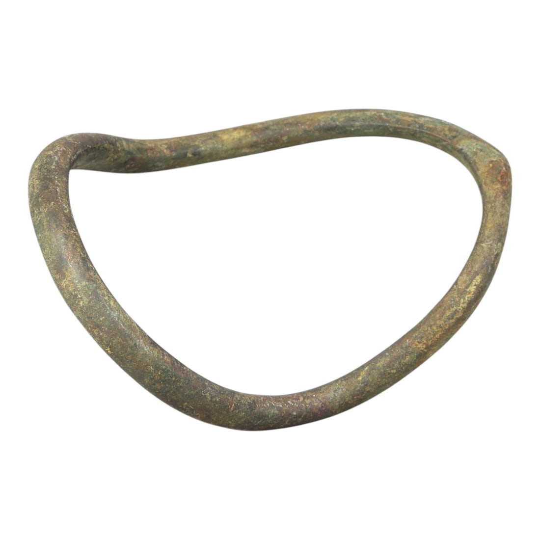 Ancient Bronze Anklet - Roman Penannular Bangle, 29BN: A penannular bronze anklet of ancient Roman origin, formed from a thick, rounded bronze band. The piece has no visible closure mechanism, indicating it was likely worn as a slip-on anklet. The surface