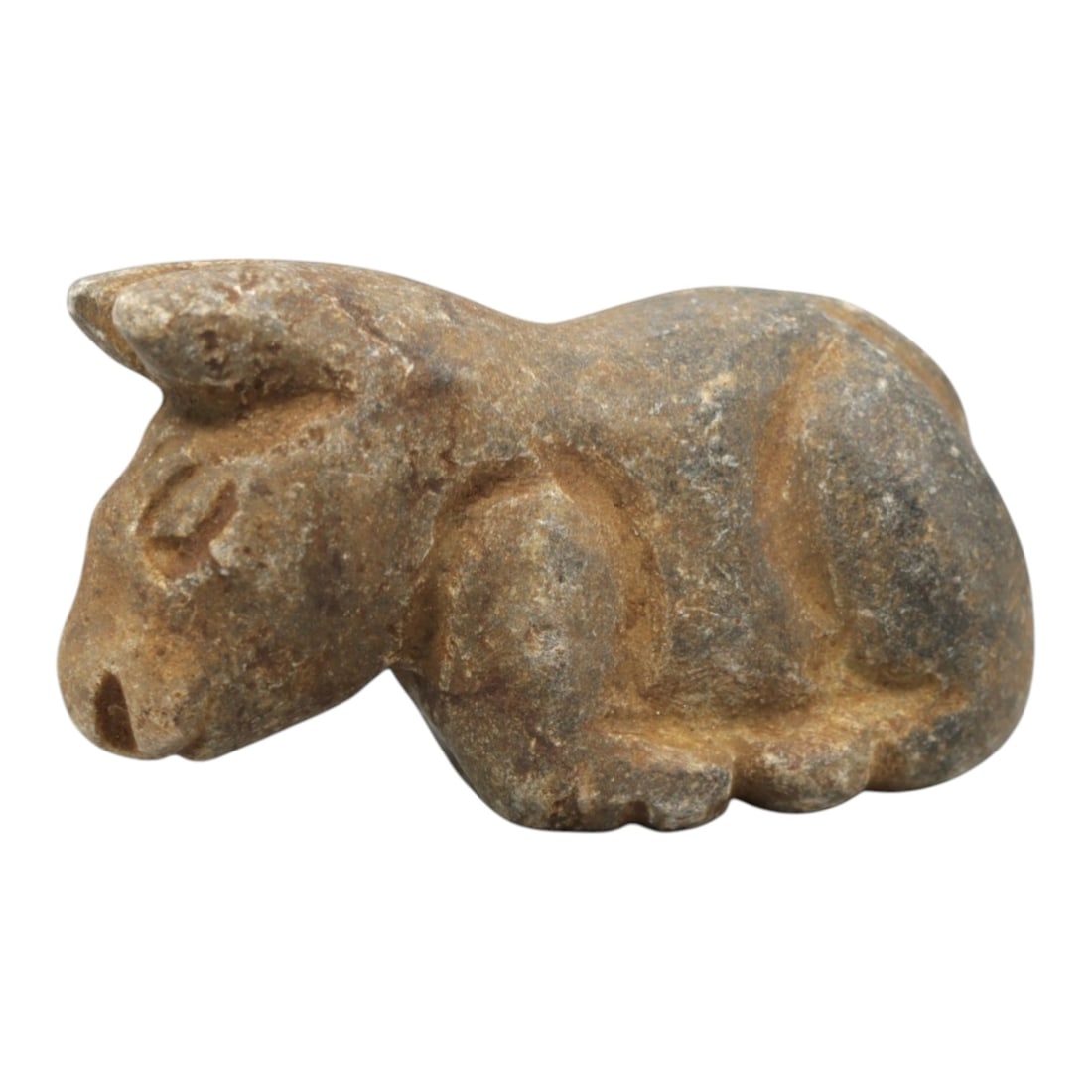 Ancient Stone Bovid Amulet - Near Eastern Animal Figurine, 27ZR: This artifact is a carved stone bovid amulet, executed in the stylized zoomorphic tradition of the ancient Near East. The amulet depicts a recumbent bovid (likely a bull or ox) with simplified anatomi