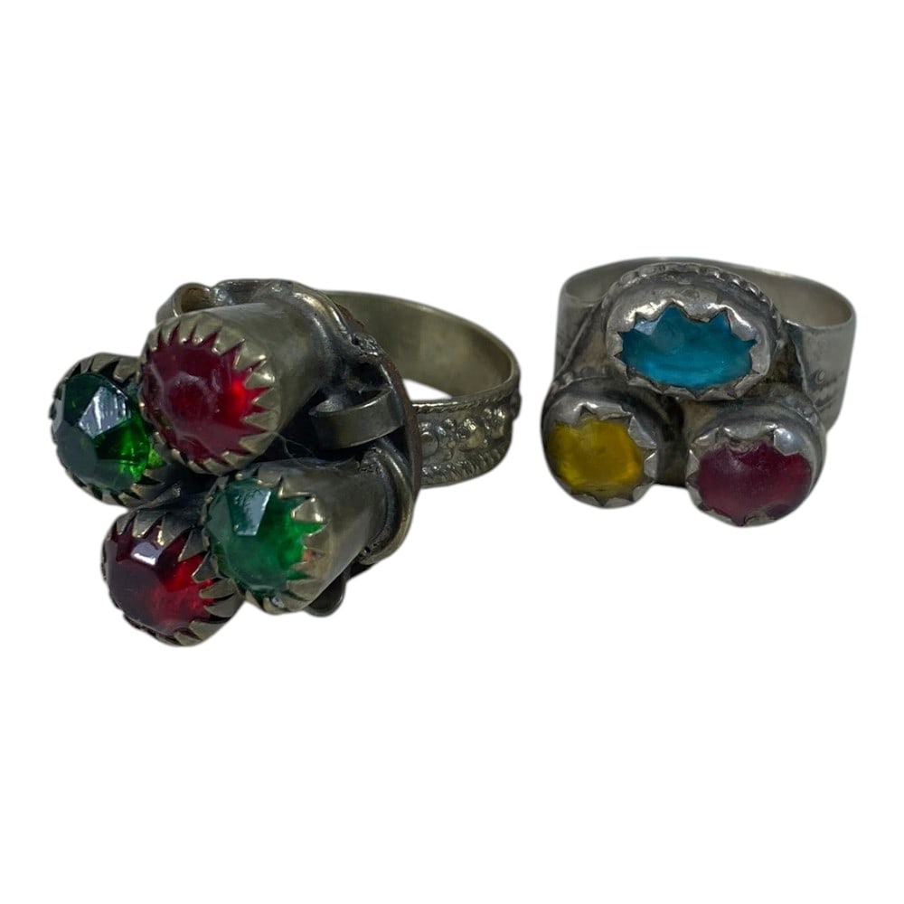 A Pair of Antique Berber Silver Rings, US Size 9-10, 34AB: This pair features two traditional Berber silver rings, showcasing the characteristic folk jewelry style of North African Berber culture. Both rings are crafted from aged silver with visible patina, a