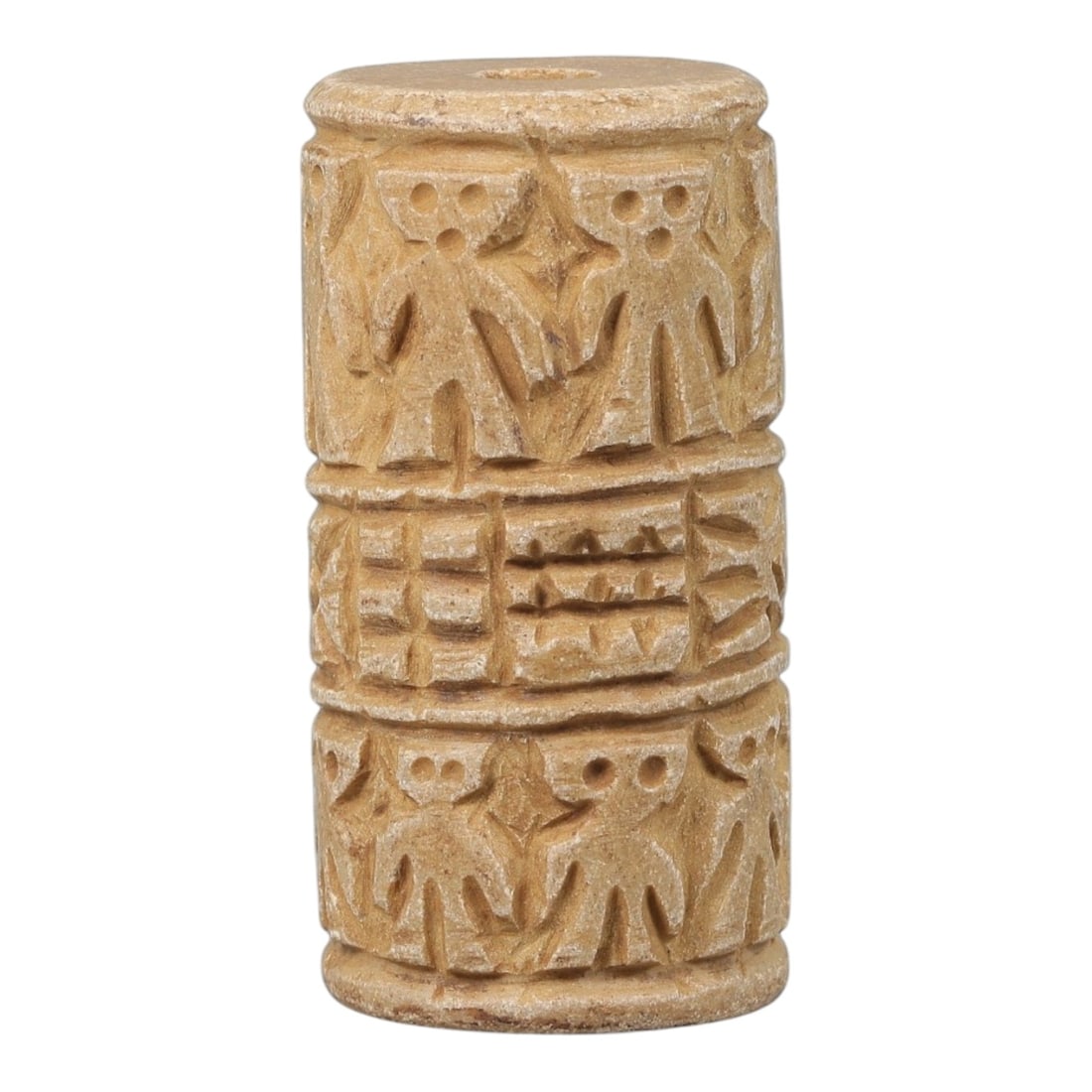 Ancient Stone Cylinder Amulet - Near Eastern Relief Figurine, 59BF: Carved from a light tan stone, this cylindrical amulet features relief decoration arranged in three horizontal registers. The top and bottom registers are populated with stylized anthropomorphic figur