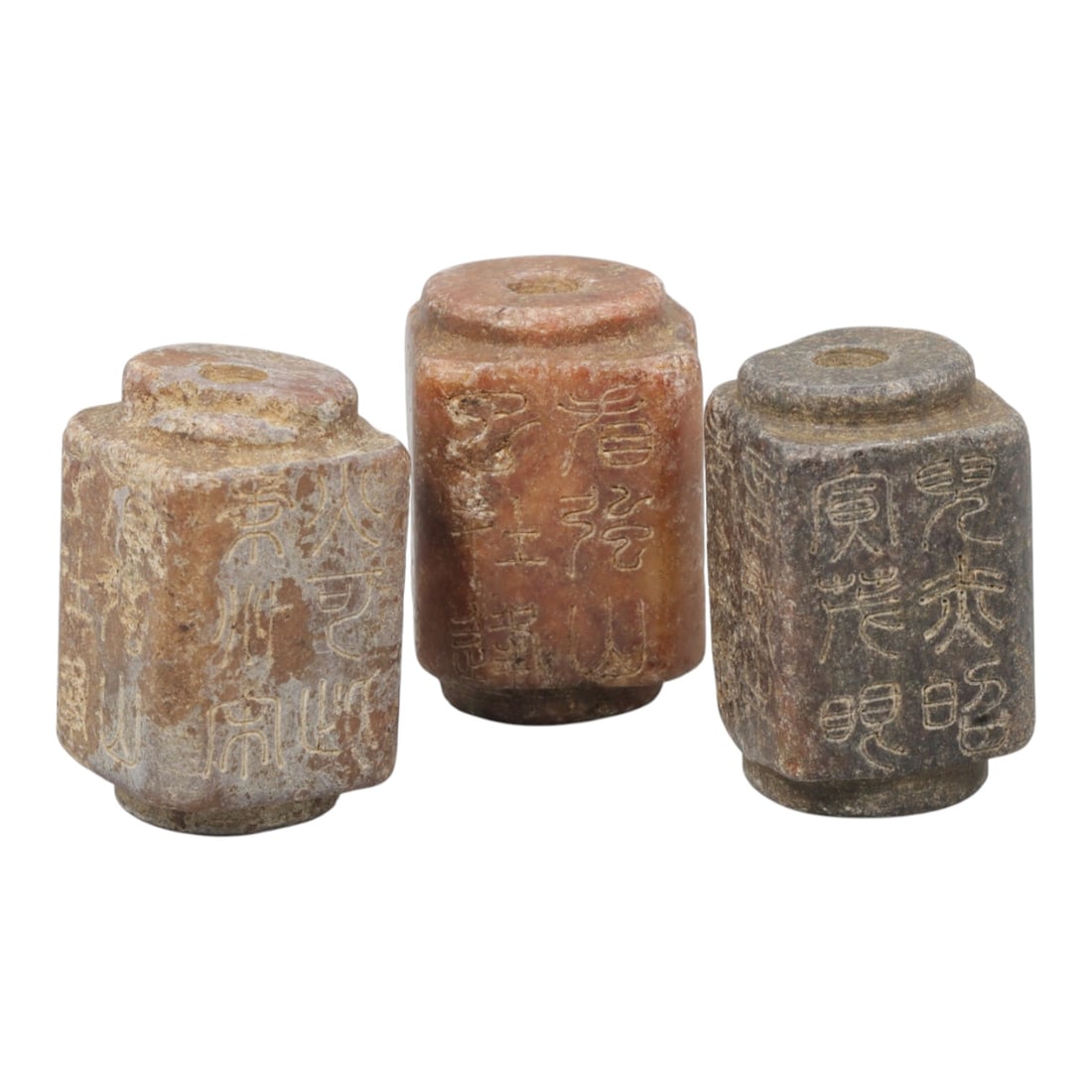 Lot of 3 Chinese Agate Inscribed Beads, Late Qing Dynasty, 78WM: Each bead is carved from agate, exhibiting natural color variations ranging from reddish-brown to dark grey with surface patination consistent with age. The objects are of faceted, cylindrical form wi