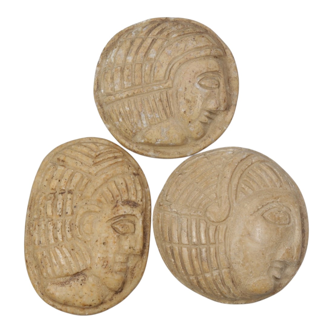Lot of 3 Ancient Coptic Egyptian Steatite Face Beads / Amulets, Circa Roman to Coptic Era, 1WT: A curated lot of three ancient Coptic Egyptian-style amulets, carved from steatite stone with natural patination and wear consistent with age. Each piece features a stylized profile face with detailed
