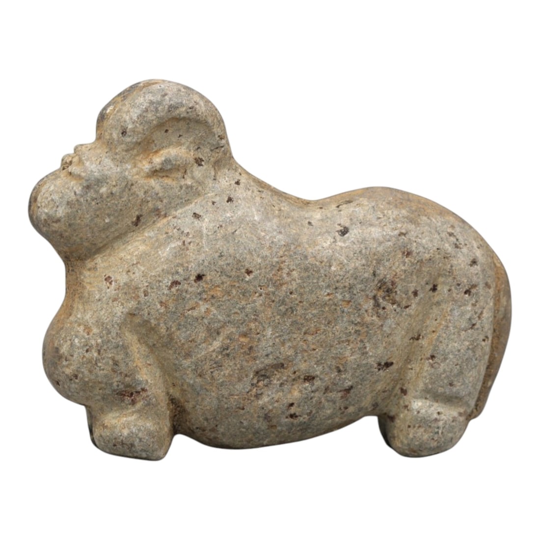 Ancient Stone Zoomorphic - Near Eastern Animal Figurine, 36ZR: Carved from dense speckled grey-brown stone with a heavily weathered earthy patina, executed in a robust, stylized form characteristic of ancient Near Eastern zoomorphic craftsmanship. The figure depi