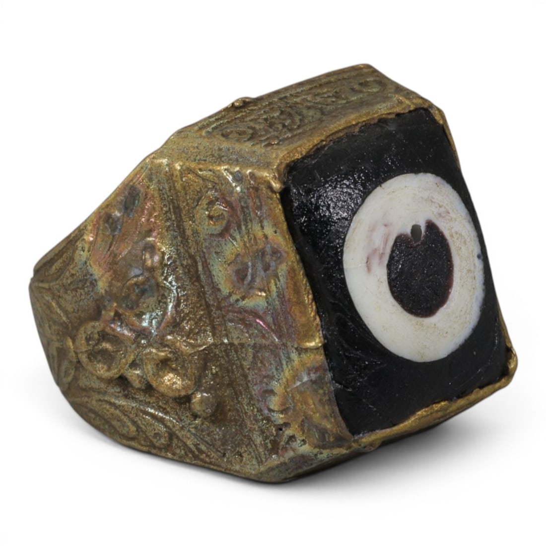 Antique Qajar Dynasty Gilt Evil Eye Ring, US Size 10, 54AJ: A gilt-metal ring of the Qajar period, US ring size 10, featuring a large square evil-eye glass inlay with a classic black, white, and dark concentric design set into a faceted bezel. The wide band is
