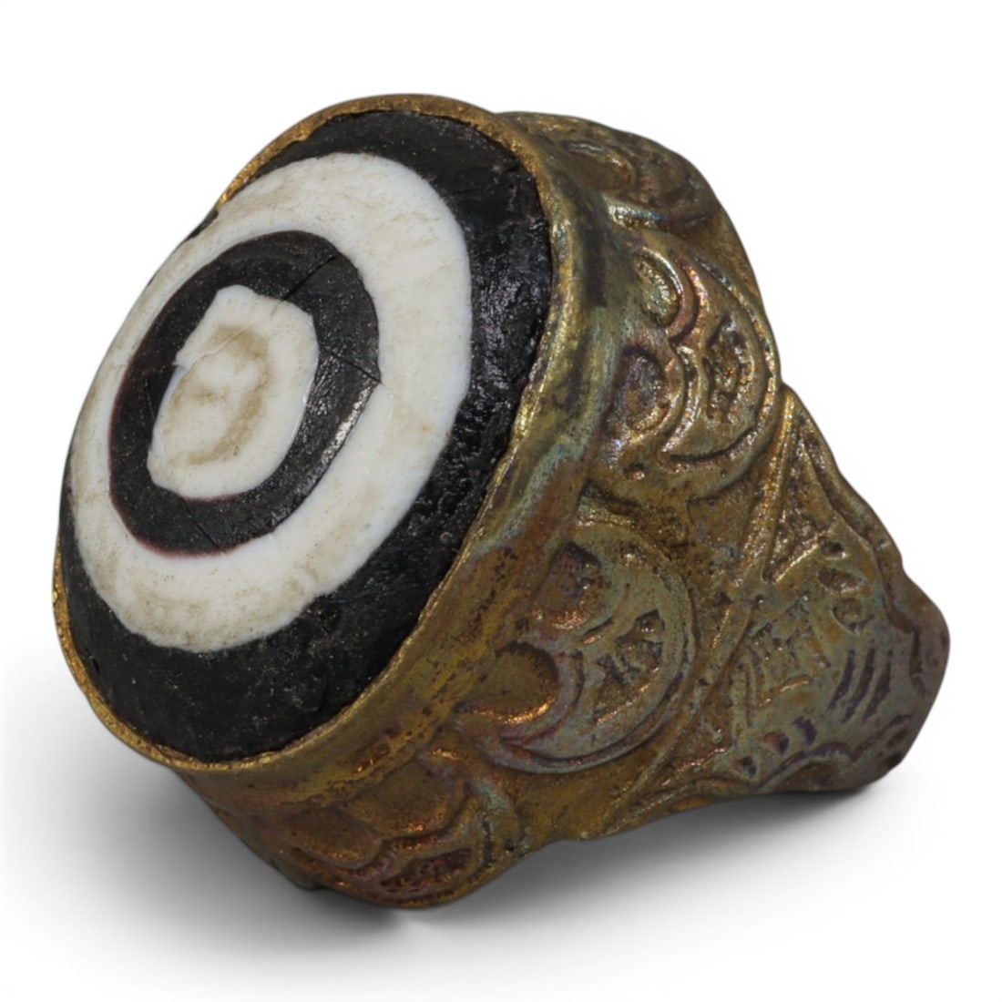 Antique Qajar Dynasty Gilt Evil Eye Ring, US Size 6.5, 29AJ: A gilt-metal ring of the Qajar period, US ring size 6.5, featuring a large domed evil-eye glass inlay with a bold concentric black-and-white design (the glass exhibits age-related cracks). The bezel a
