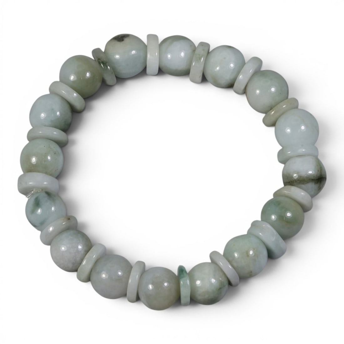 Natural Type A Burmese Jadeite Beaded Bracelet, 1AK: I'm happy to show you this delicate, one-of-a-kind jadeite bracelet! This 51mm diameter bracelet features a sweet mix of round and disc-shaped jadeite beads, creating a soft, rhythmic design. The main