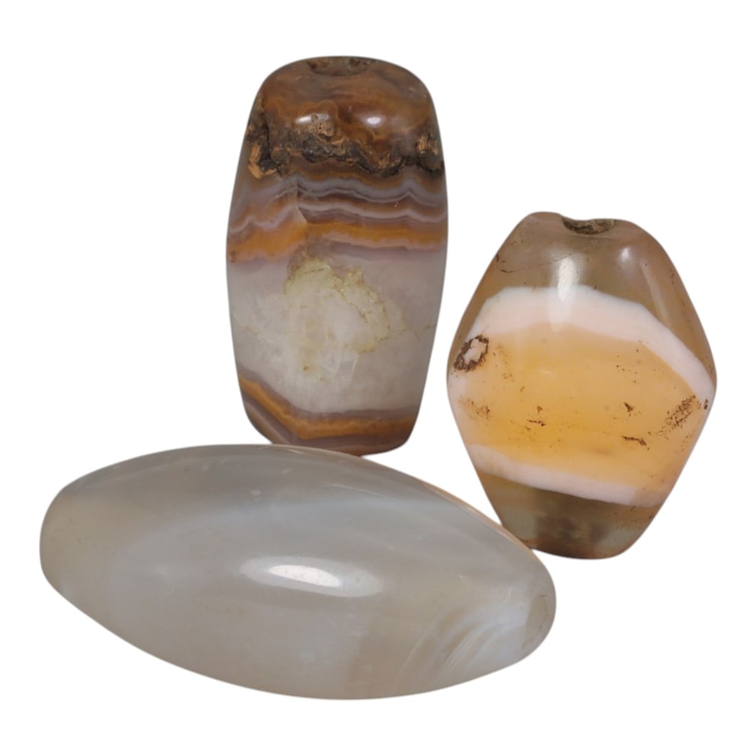 Lot of 3 Antique Central Asian / Himalayan Banded Agate Trade Beads, 15th-19th Century., 44AK: This lot comprises 3 antique banded agate beads, characteristic of Central Asian or Himalayan trade traditions. Each bead exhibits signs of significant age, including natural patination, surface wear,