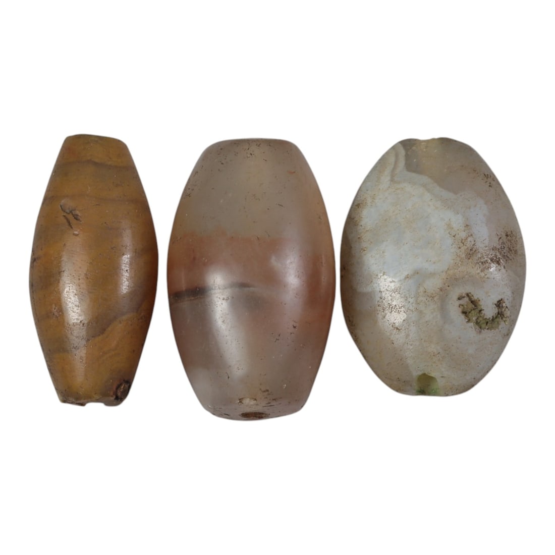 Lot of 3 Antique Central Asian / Himalayan Banded Agate Trade Beads, 15th-19th Century., 55AK: This lot comprises 3 antique banded agate beads, characteristic of Central Asian or Himalayan trade traditions. Each bead exhibits signs of significant age, including natural patination, surface wear,