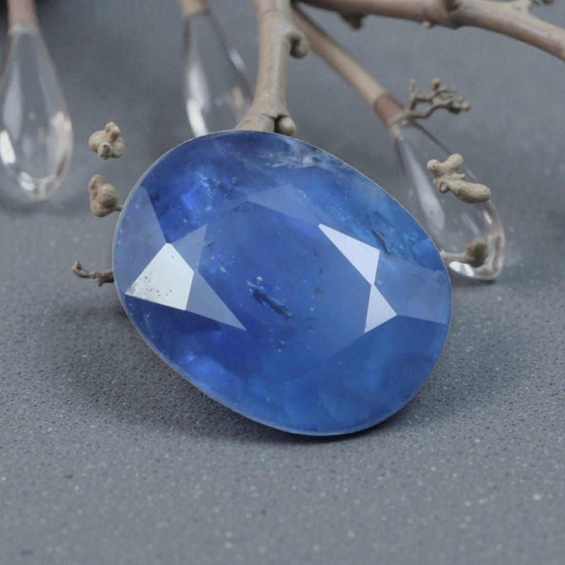 1.35 Carats Natural Madagascar Blue Sapphire Oval Cut, 31AL: This oval-cut natural blue sapphire showcases a vivid, saturated royal blue hue, reminiscent of the clear tropical skies above Madagascar. The faceted cut features well-proportioned facets that create